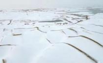 ​塔克拉玛干沙漠迎来今冬首场降雪